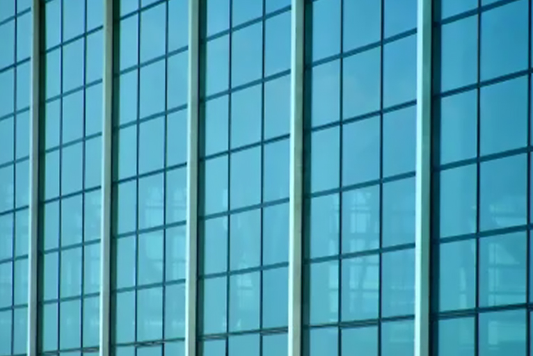 Sprayed building glass