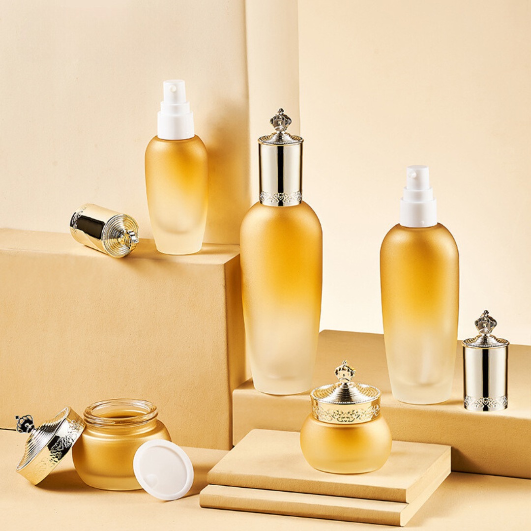 YF291 Luxury Empty Golden Glass Lotion Bottle with Pump and Cream Jar with Lids for Cosmetic Glass Packaging