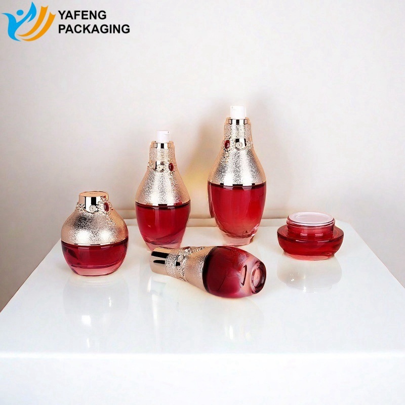 Elegant Glass Bottles with Red Ruby Caps for Beauty Packaging
