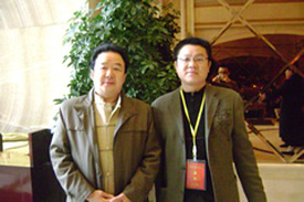 罗盛午与世界中小企业联合会执行主席张维新先生(左)合影