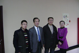 罗盛午（右二）与世界华商企业家联谊会执行副主席洪景华（左二）等合影