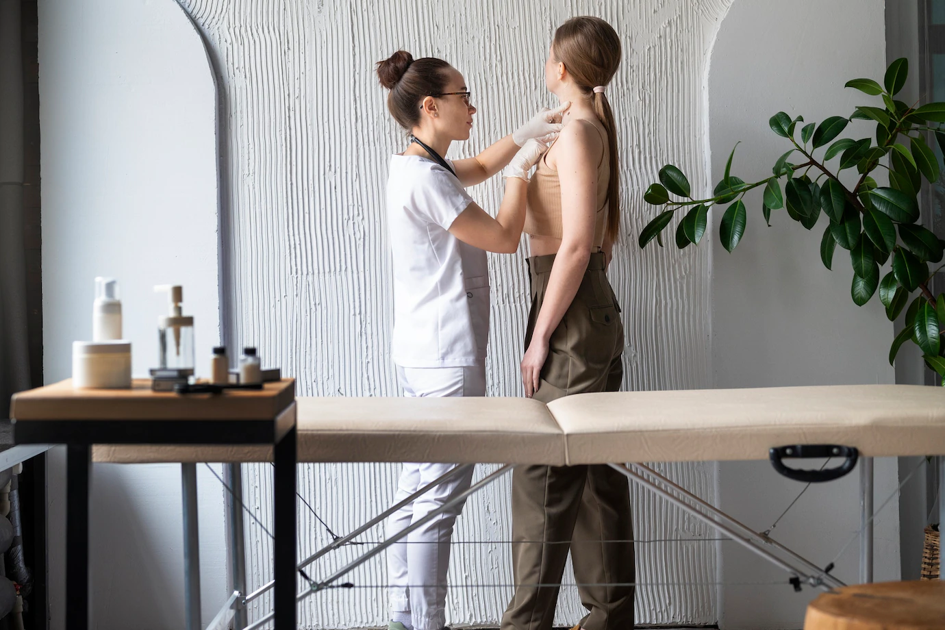 female-doctor-diagnosing-melanoma-body-female-patient_23-2149365859