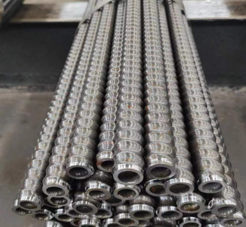 Self drilling anchor bar