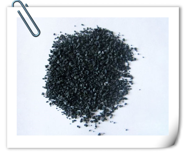 Acid washing low ash activated carbon