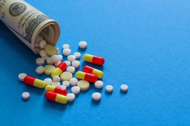 1641549397392310.jpg close-up-assorted-pharmaceutical-medicine-pills-tablets-dollars_68196-1190.jpg