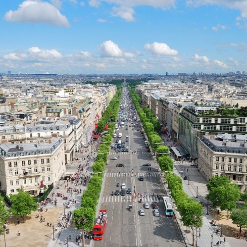 Brimming with fancy boutiques and dining terraces, the Champs-Élysées epitomizes the fashionable panache of Paris. You'd never guess that the most monumental boulevard in Paris used to be a desolate swamp. The marshland was converted into an avenue by renowned landscape designer André Le Nôtre in the 17th century. Two centuries later, the city planner Baron Georges-Eugène Haussmann added the grey stone Mansard-roofed buildings that give the boulevard its classic Parisian look.