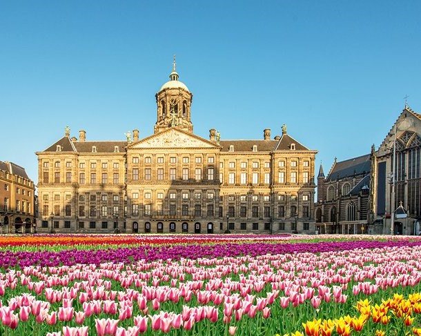 Formerly the Town Hall, the Royal Palace of Amsterdam (Koninklijk Paleis van Amsterdam) serves as the King's residence when he's in the city. Its construction was a monumental task when started in 1648 and required the sinking of 13,659 piles to support the mammoth structure. Based upon the architecture of ancient Rome, the exterior is strictly classical, while the interior is magnificently furnished, its apartments decorated with a wealth of reliefs, ornamentation, marble sculptures, and friezes. 