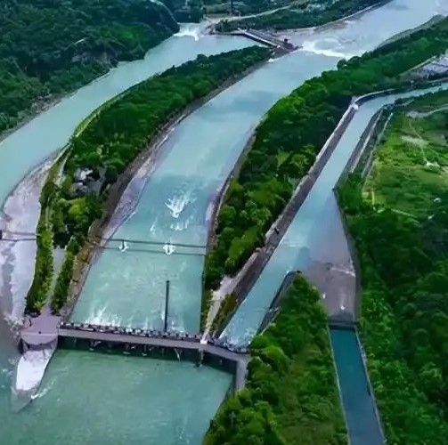 Dujiangyan is an ancient irrigation infra-structure built in 256 BC during the Warring States Period of China by the Kingdom of Qin. It is located in the Min River in Sichuan.
Dujiangyan Irrigation Project is still in use today to irrigate over 5,300 square kilometers of land in the region. The project consists of three important parts, namely Yuzui, Feishayan and Baopingkou scientifically designed to automatically control the water flow of the rivers from the mountains to the plains throughout the year.