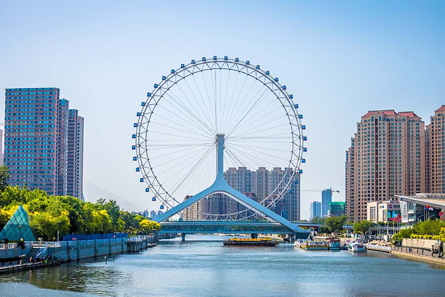 The full name of which is The Yongle Bridge Tientsin Eye, connects the Hebei and Hongqiao districts across the Haihe River. It is a Ferris wheel built across river and integrated with bridge.